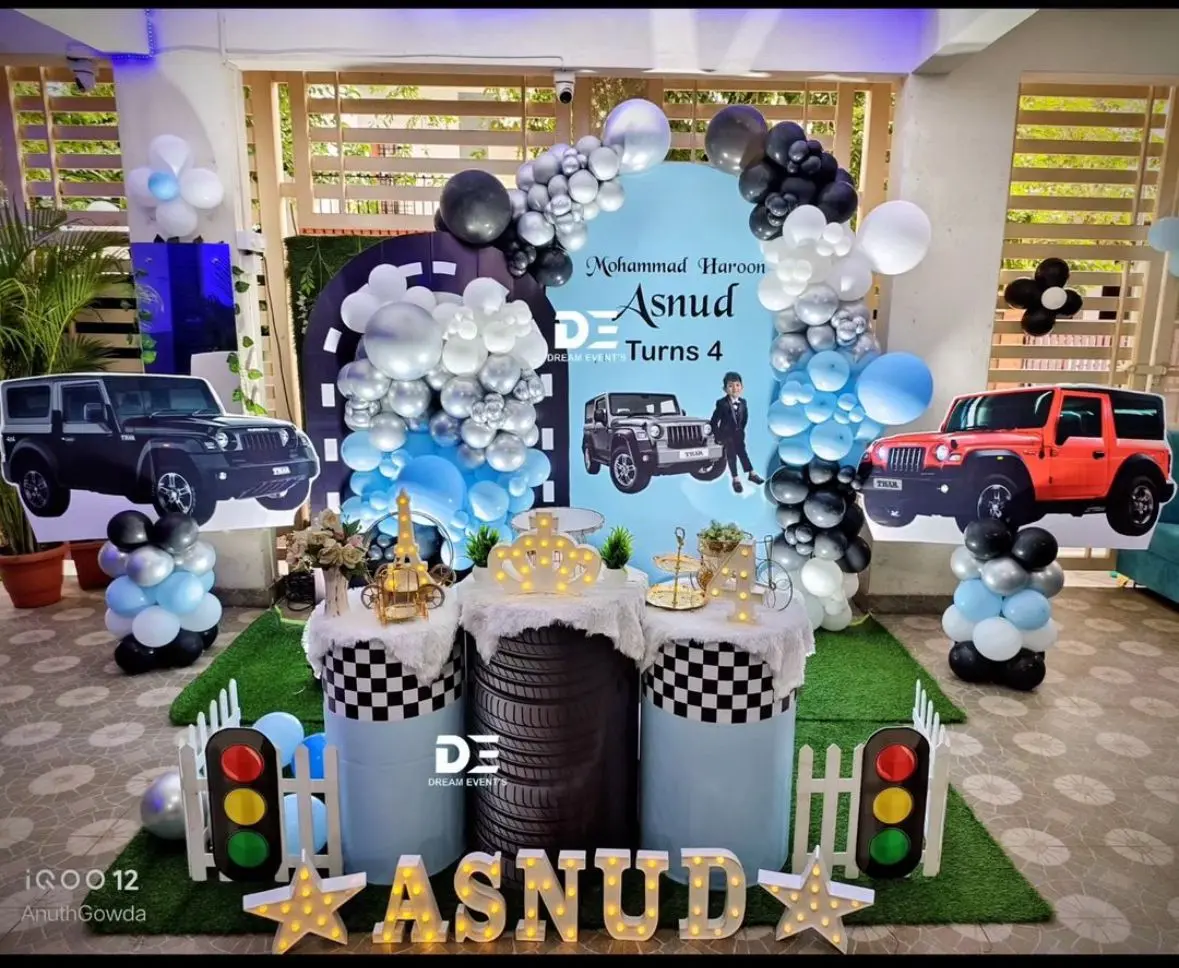 Car theme birthday decoration with balloon backdrop in Bangalore